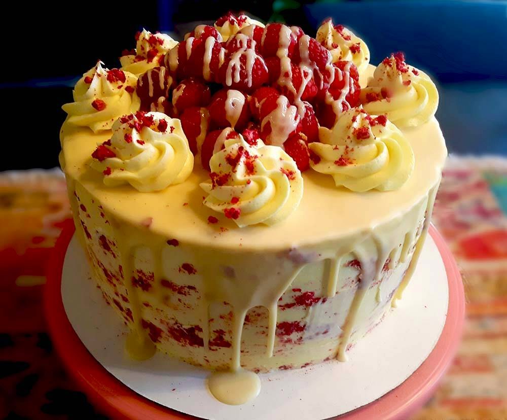 A raspberry white chocolate keto mini cake